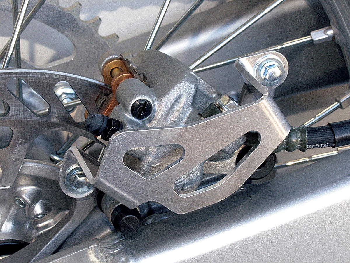 WORKS CONNECTION Rear Caliper Guard for RMZ 250/450 25-017